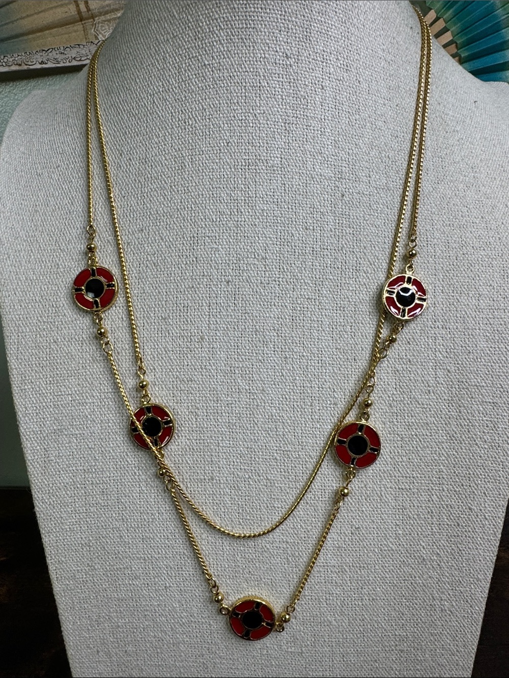 Gold-Tone Double Strand Necklace with Red and Black Enamel Discs